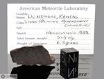 DENSMORE 1879 - Recuperata nel 1879, Contea Norton, Kansas, USA. Chondrite L6. Massa Totale recuperata 37.2 kg. Pezzo in collezione: fetta gr.6.3 dalla collezione AML #H41.12 (McM68)