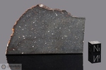 KAUFMAN - Recuperata nel 1893, Contea Kaufman, Texas, USA. Chondrite L5. Massa totale recuperata 23 kg. Pezzo in collezione: fetta gr.54.3 (McM129)