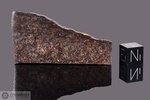 ABU MOHAREK - Recuperata il 21 Ottobre 1997, Al Wadi Al Jadi, Egitto. Chondrite H4. Massa totale recuperata 4500 grammi. Pezzo in collezione: fetta gr.15 (McM001)
